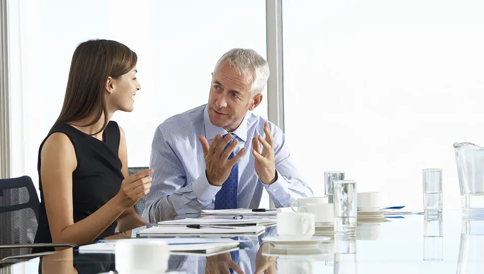 Two professionals in conversation — applying knowledge through realistic dialogue