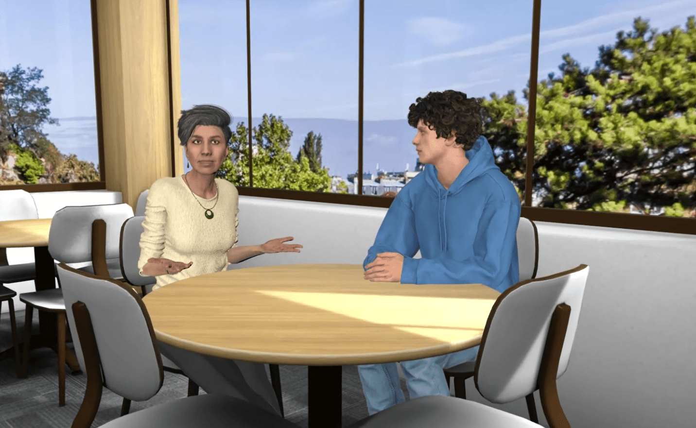 A mentor and student talking through a scenario at a cafe table in AliveSim