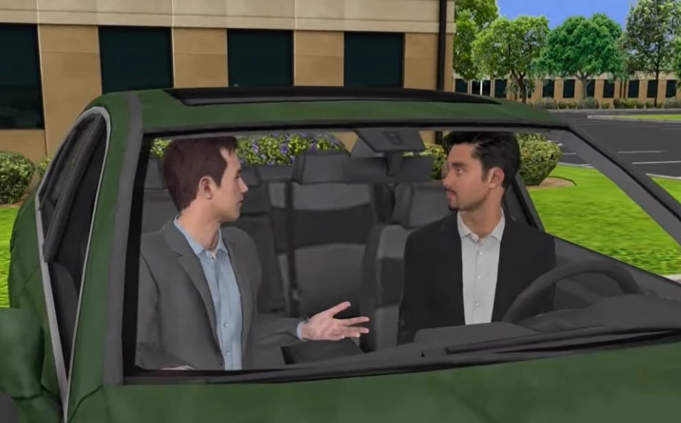 A manager and rep talking in the car during a ride-along in an AliveSim scenario