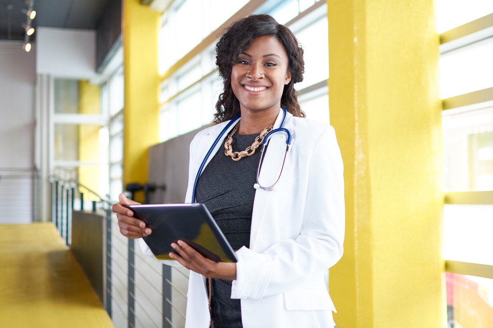 Female doctor holding tablet Female doctor holding tablet